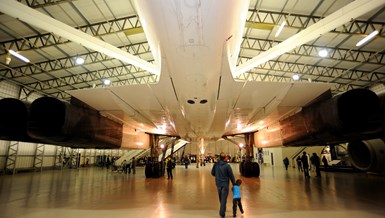 View of the underside of the Concorde inside an aircraft hangar