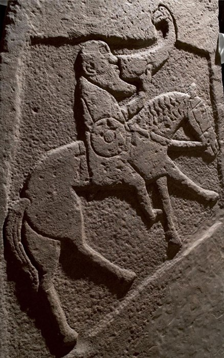 A Pictish stone from Bullion, Angus, shows a bearded warrior on horseback holding a huge drinking horn with a large bird-headed mount at its tip.
