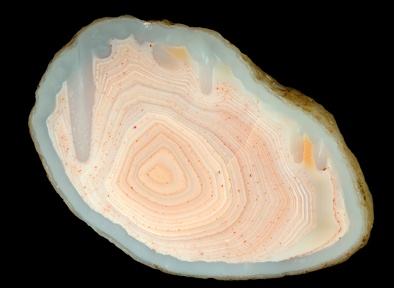 Pale pink agate from Ballindean. Note the stalactites and banding.