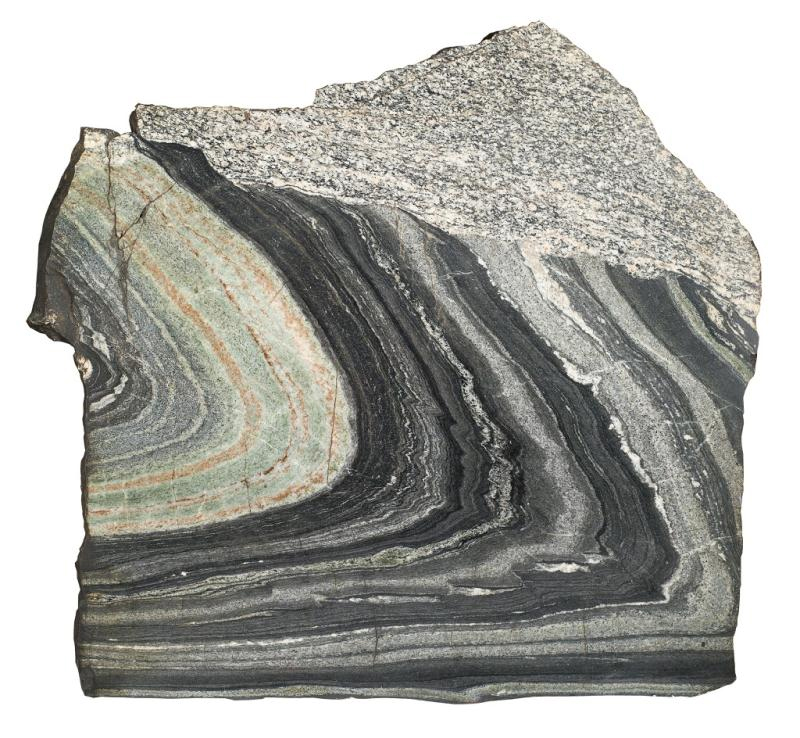 This large, heavy, polished specimen on display in the Restless Earth gallery in the National Museum of Scotland shows the contact between granite, an igneous rock, and gneiss, a metamorphic rock. It was collected in Balmoral in Aberdeenshire.