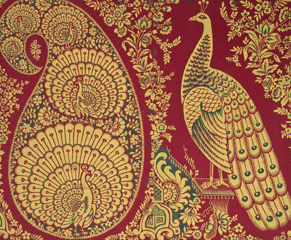 Peacocks in a paisley shape and large peacock right