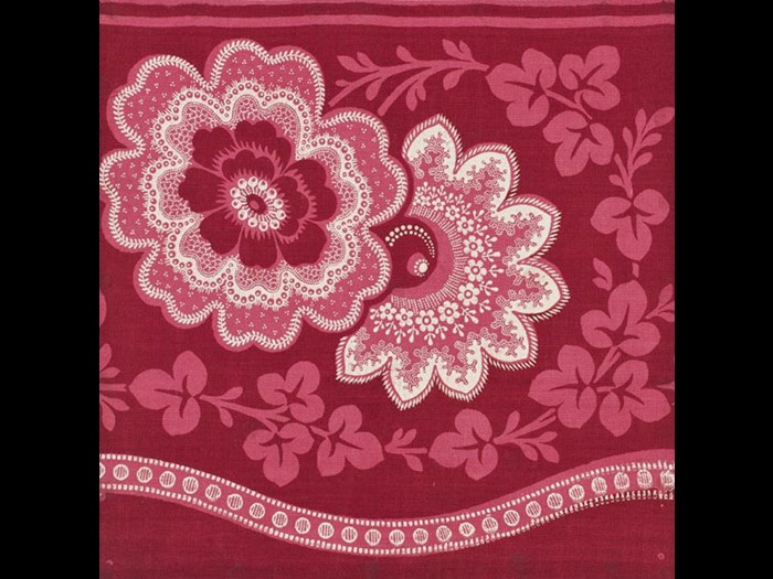 White flowers on red and pink ground with border
