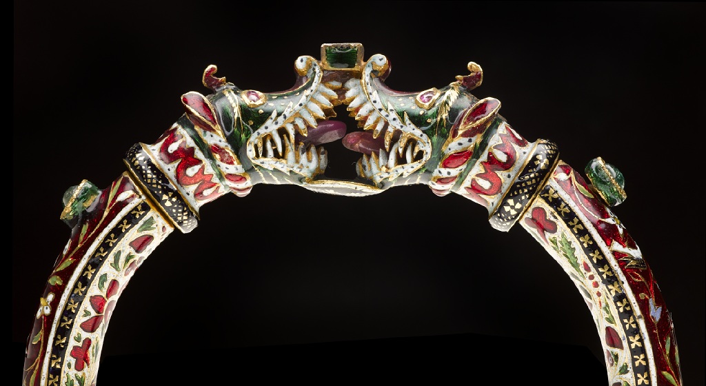 One of a pair of makara-headed bracelets, gold with Jaipur enamel, set with emeralds, diamonds and rubies: Northern India, Rajasthan, late 18th/early 19th century, formerly in the possession of Maharaja Duleep Singh.