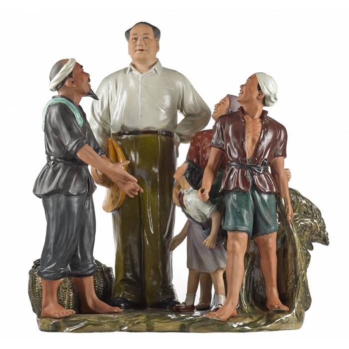 Porcelain figure group of people looking up at Mao Zedong