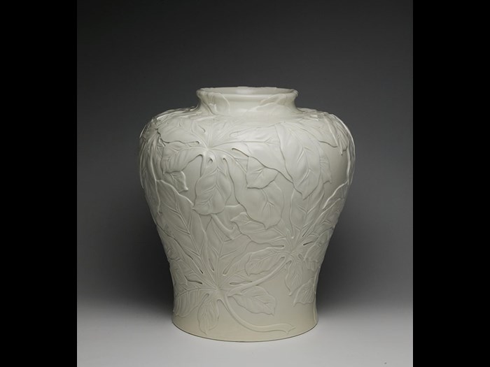 Large stoneware vase decorated in low relief with foliage, possibly Suwa Sozan design, by Kinkozan, c.1900.
