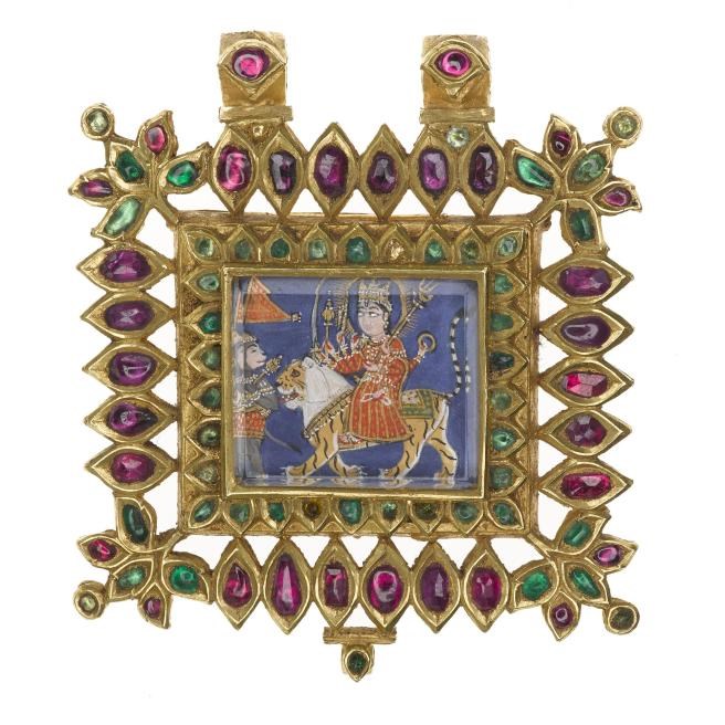 Gold pendant inlaid with rubies and emeralds depicting the Hindu goddess Devi