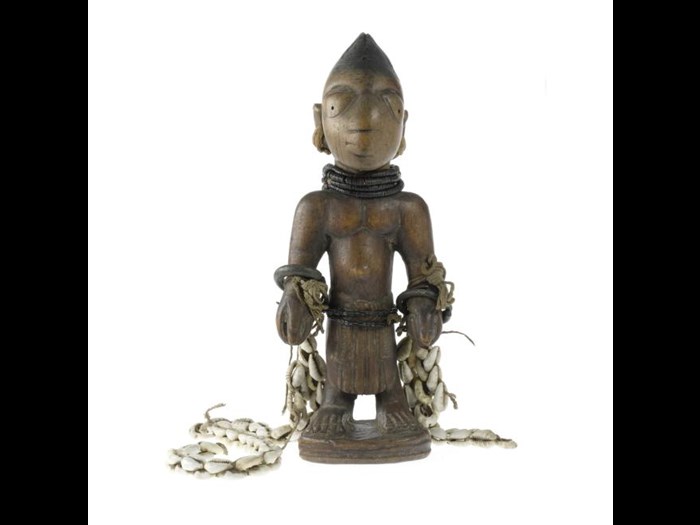 Male figure, one of a pair of ere ibeji figures, made in southwestern Nigeria.