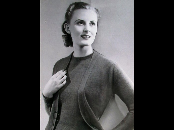 Model wearing a twinset from a Pringle catalogue, 1940s.
