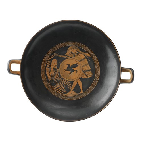 Kylix depicting a Greek hoplite slaying a Persian inside, by the Triptolemos painter, 5th century BC