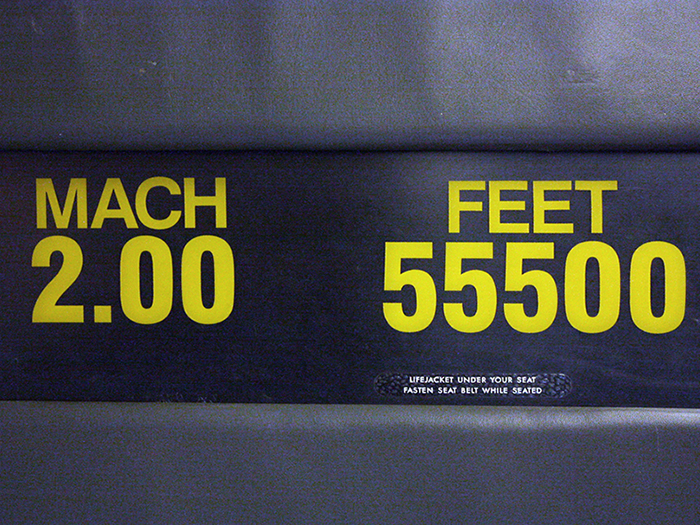 Mach meter showing speed and altitude in bright yellow letters on black