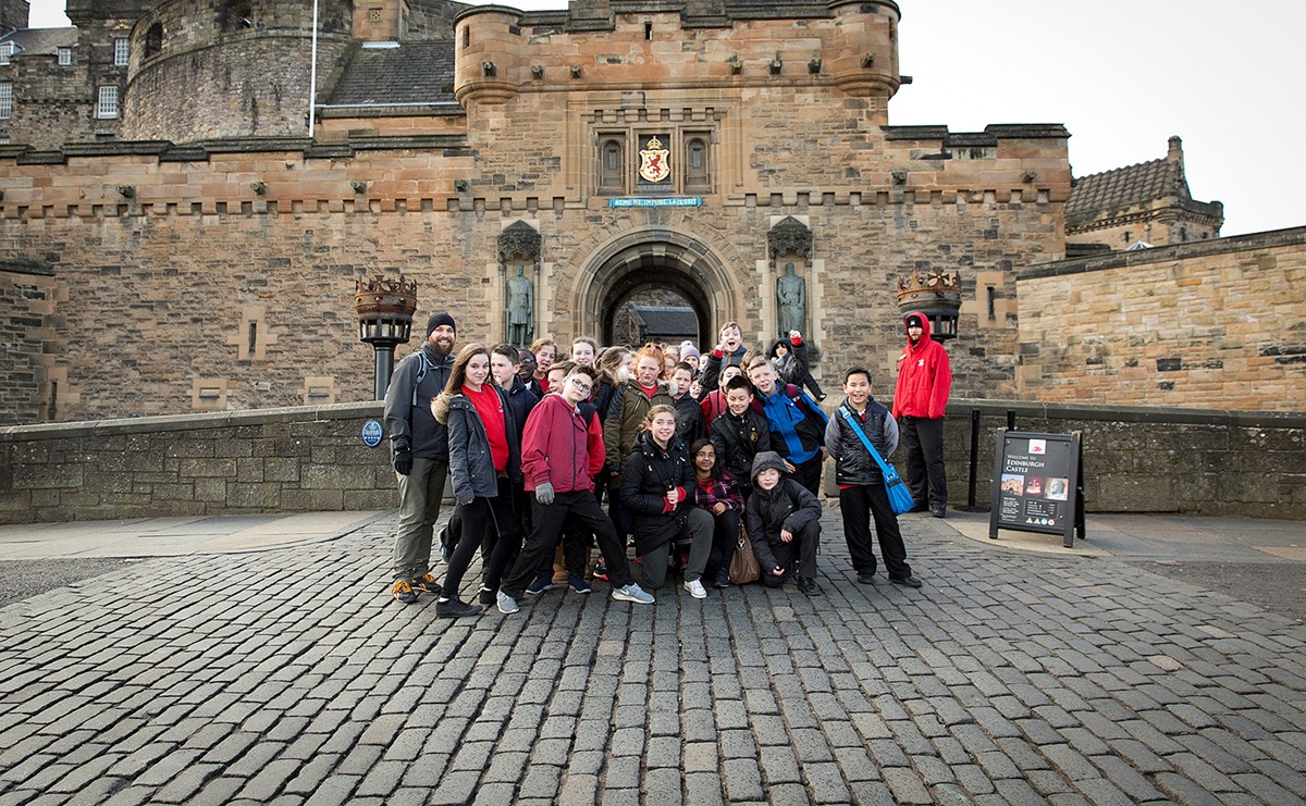 A school group outside the entrance to Edinburgh Castle