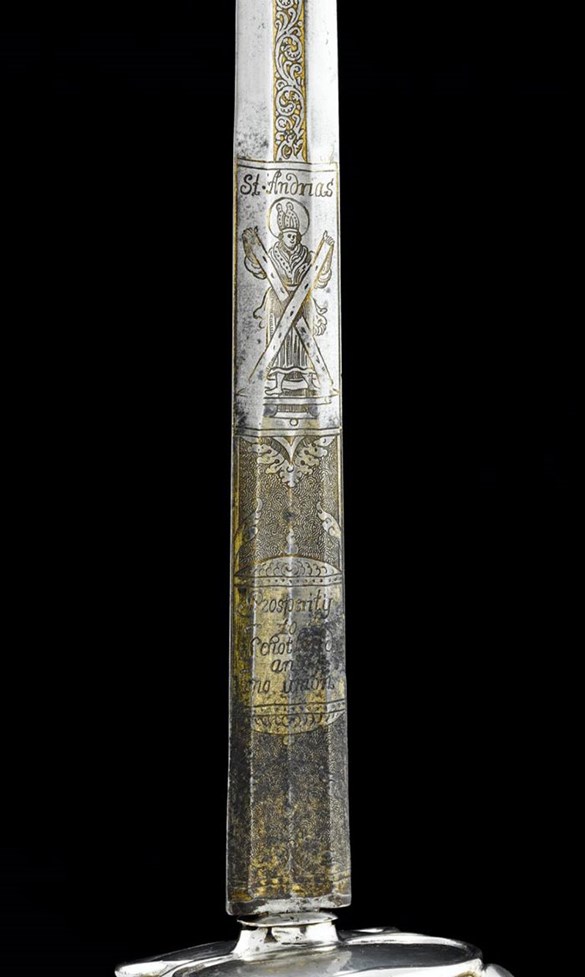 The inscription on the blade of this broadsword, made around 1715, proclaims support for the Jacobite cause. The inscription reads: ‘Prosperity to Schotland and no Union’ and ‘For God my Country and King James the 8’. Above it is an image of St Andrew.