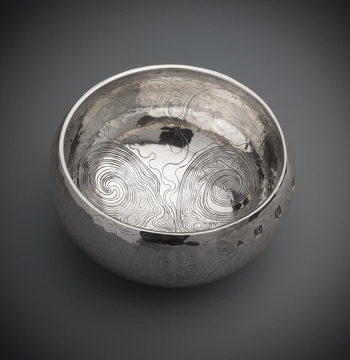 Silver bowl engraved on the exterior with irregular running scrollwork by Malcolm Appleby.