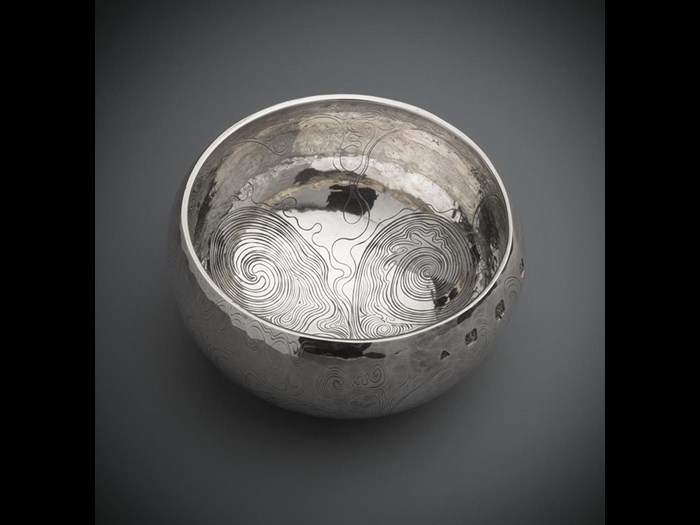 Silver bowl engraved on the exterior with irregular running scrollwork by Malcolm Appleby.