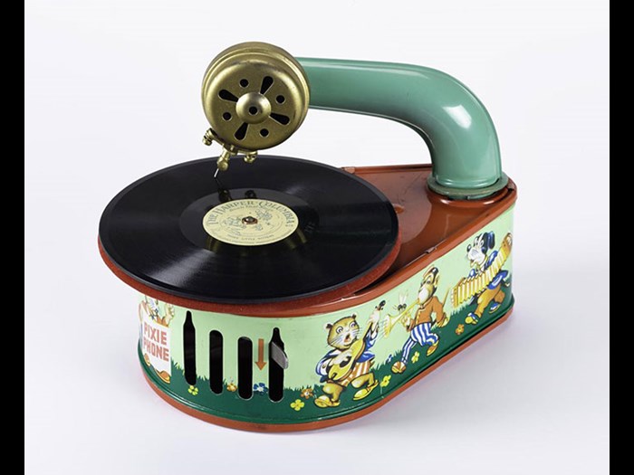 Pixie Phone toy gramophone in pear-shaped tinplate case decorated with animal musicians, in maker's carton, by Gama, Germany, 1950.