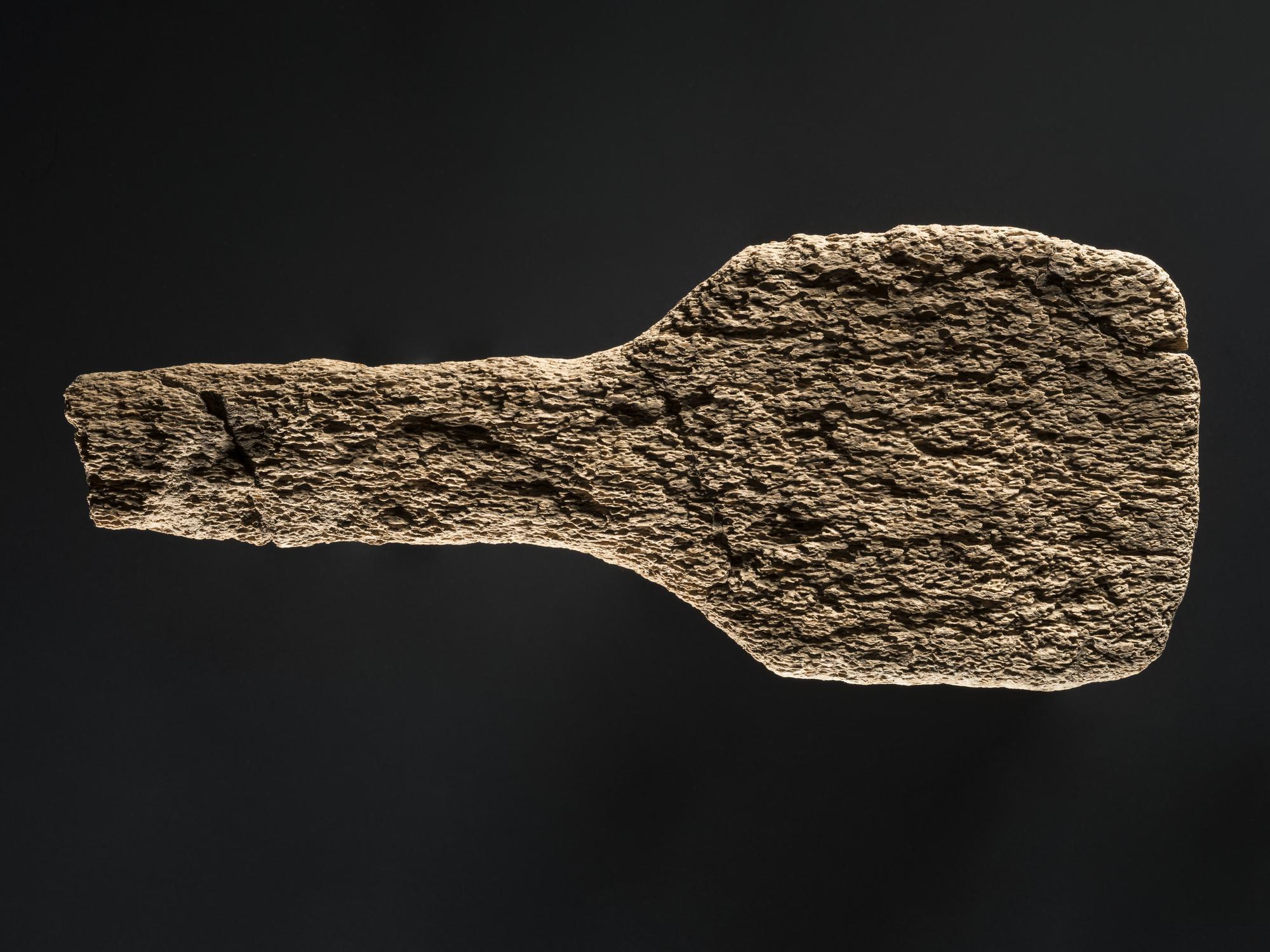 Spatulate implement