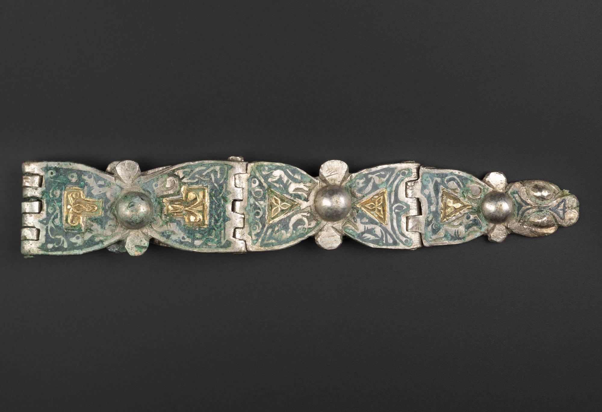 Image of Hinged strap, from the Viking age Galloway Hoard © National Museums Scotland