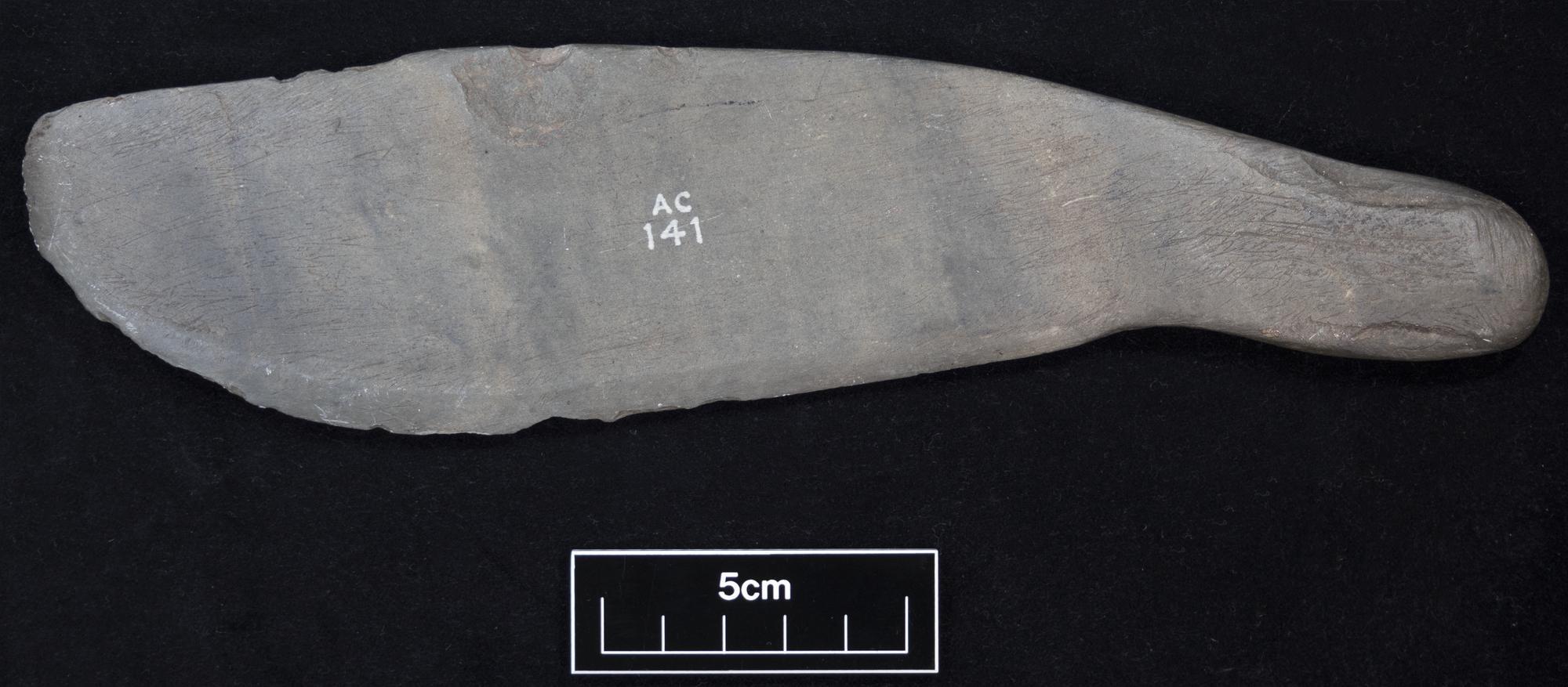 Image of Ground stone knife with handle of thin micaceous sandstone, from Shetland © National Museums Scotland