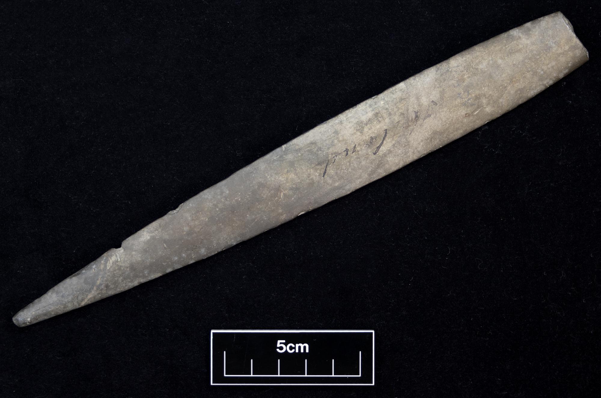 Image of Elongated pointed blade or knife, broken at one end, from Cunningsburgh, Shetland © National Museums Scotland