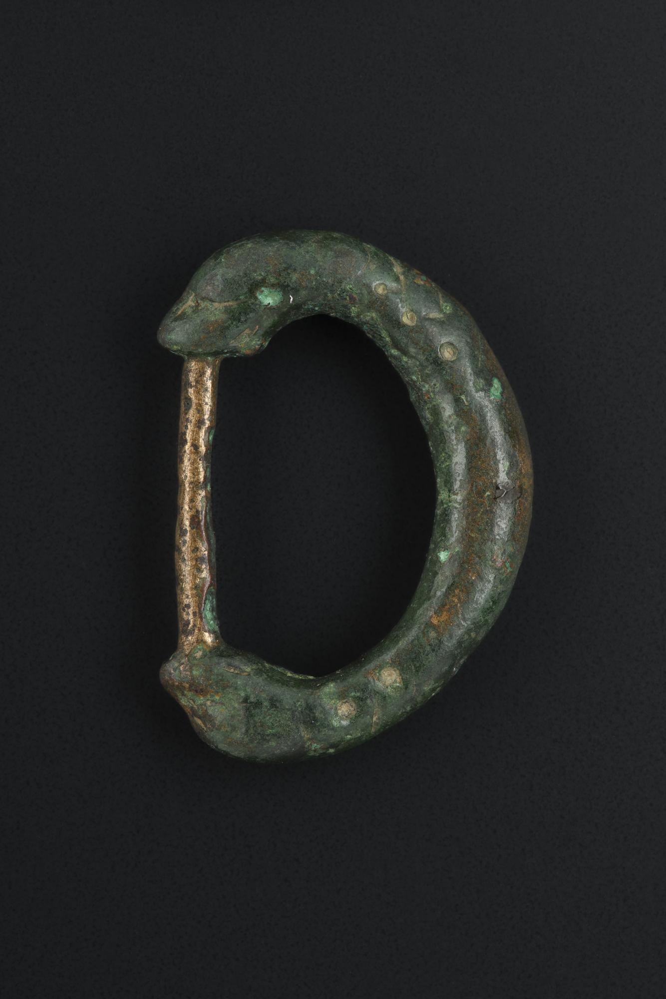Image of Oval bronze buckle ornamented at ends with beasts