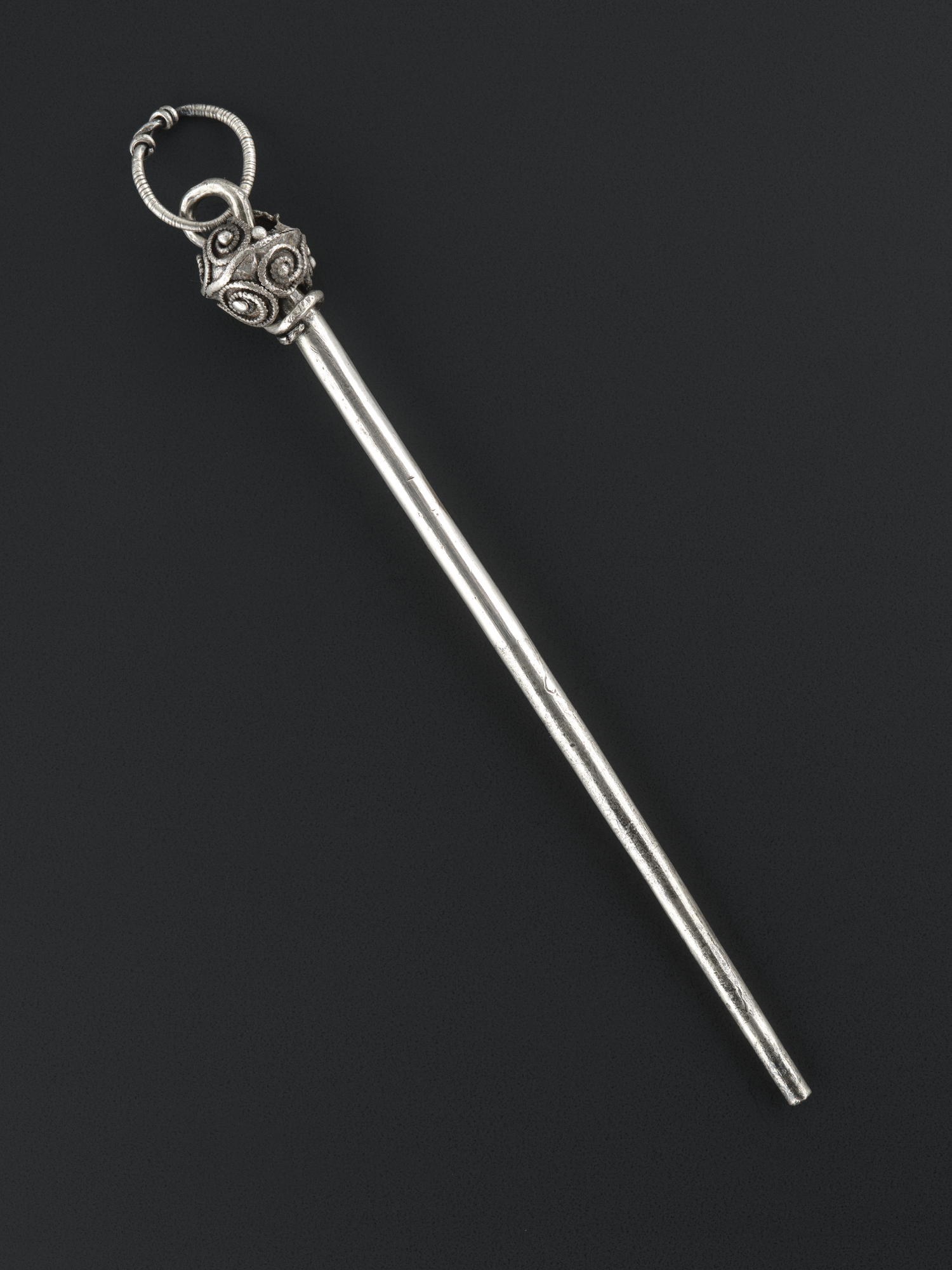 Image of Silver hairpin with globular head of filigree work, from a Viking burial at Ballinaby, Islay © National Museums Scotland