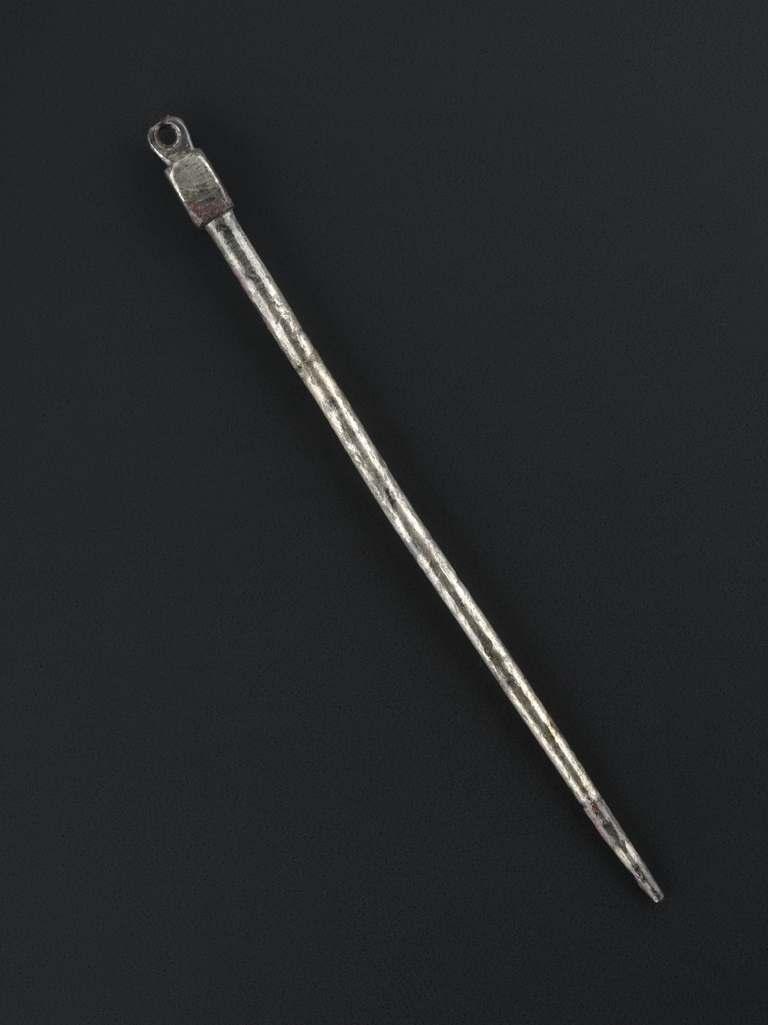 Image of Dress pin of silver, (ring-headed pin minus ring), from a Viking boat burial at Kiloran Bay, Colonsay, Argyll, 875 - 925 AD © National Museums Scotland