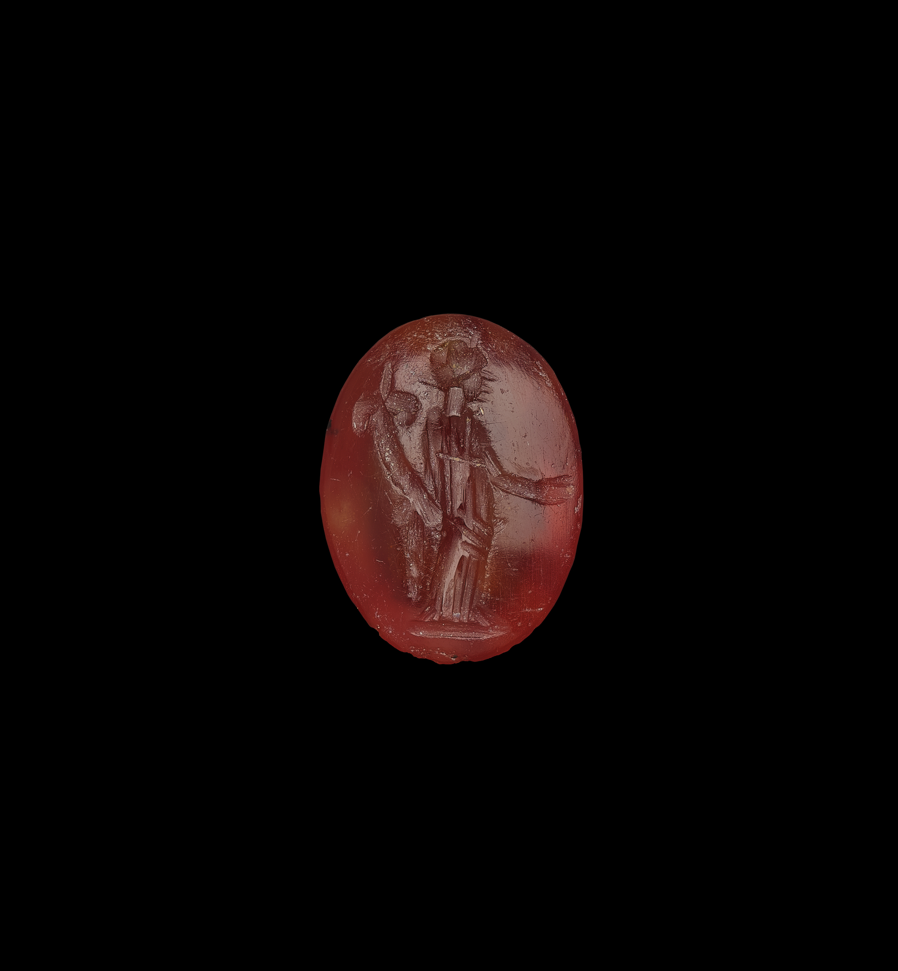 Image of Cornelian intaglio depicting a goddess with patera and cornucopia, part of the Cruickshank collection of finds from Newstead, Roxburghshire © National Museums Scotland