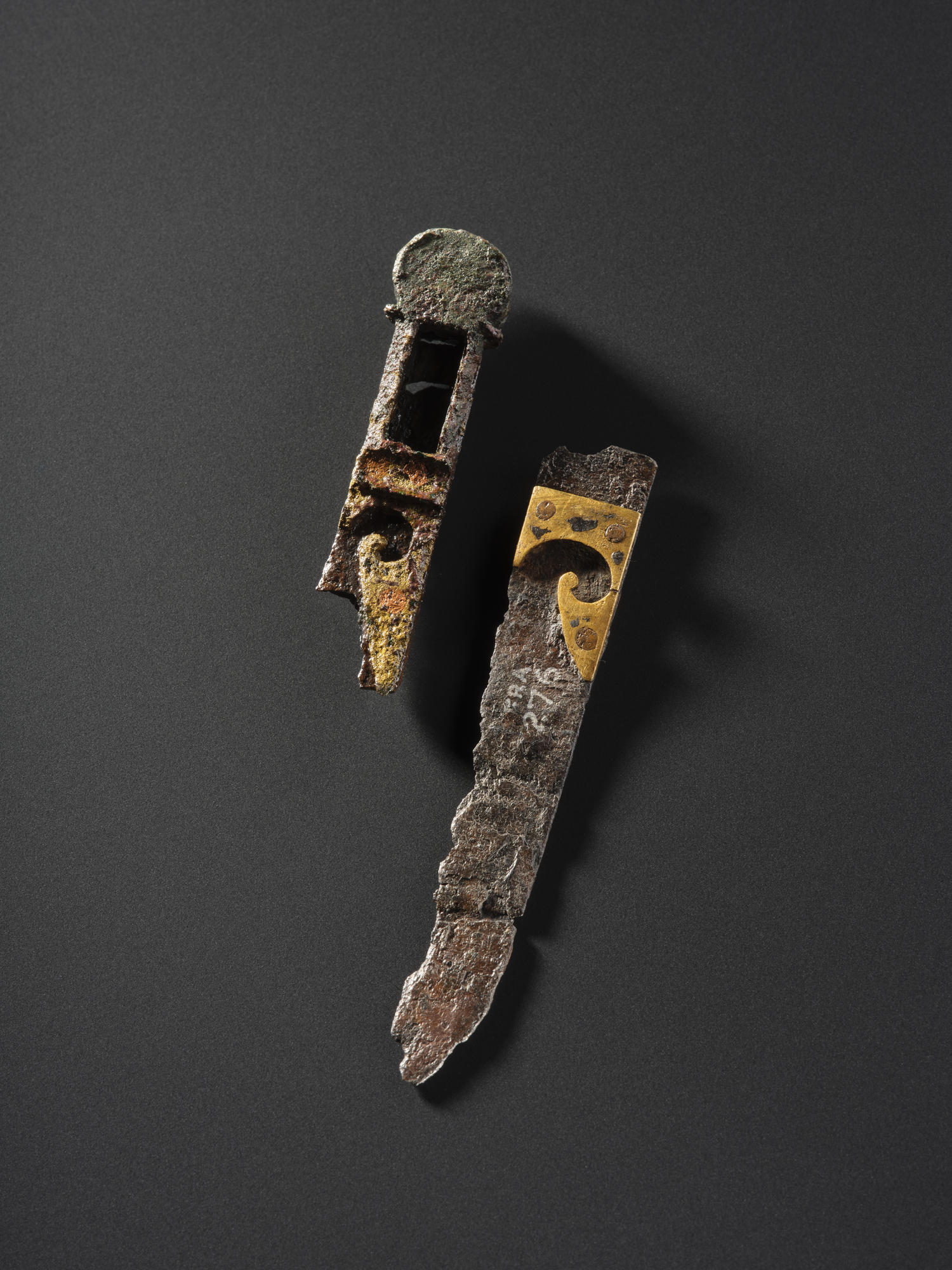 Image of Knife handle terminal of bronze, from the Roman site at Newstead, Roxburghshire, 80 - 180 AD © National Museums Scotland