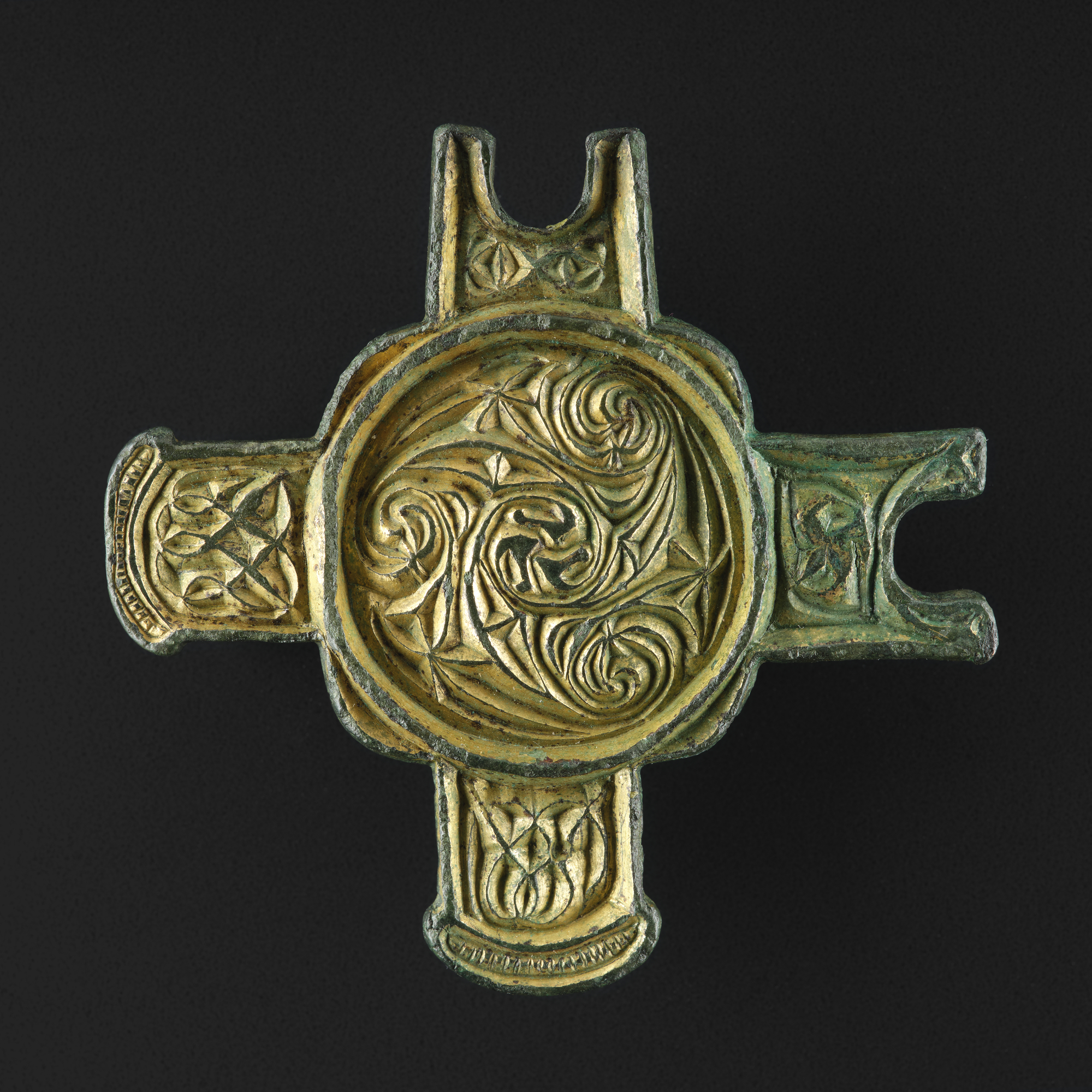 Image of Cruciform mount of gilt copper alloy, from the west of Scotland © National Museums Scotland