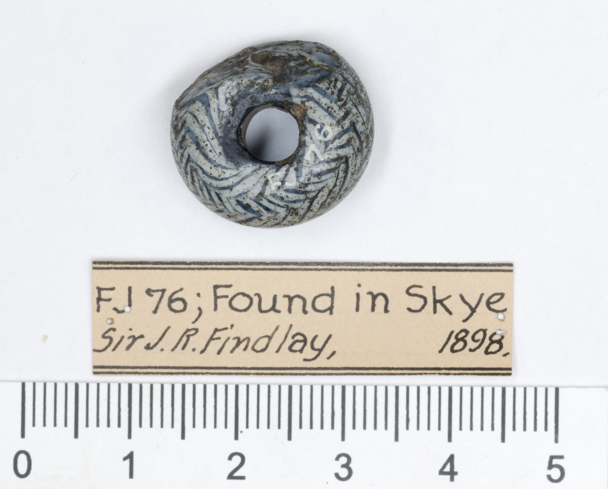 Image of Adder bead, from Skye, Inverness-shire © National Museums Scotland