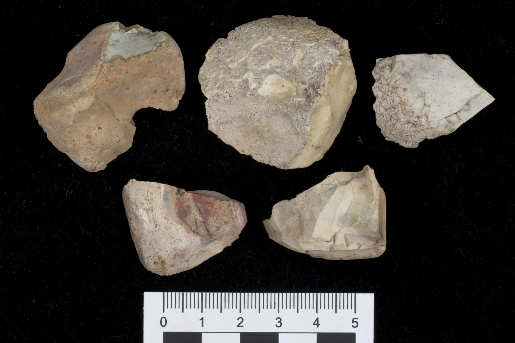 Image of Fragments of two small urns of pottery, and five flakes, several chips, one core and one pebble of flint, from Cragabus Cists,  Islay © National Museums Scotland