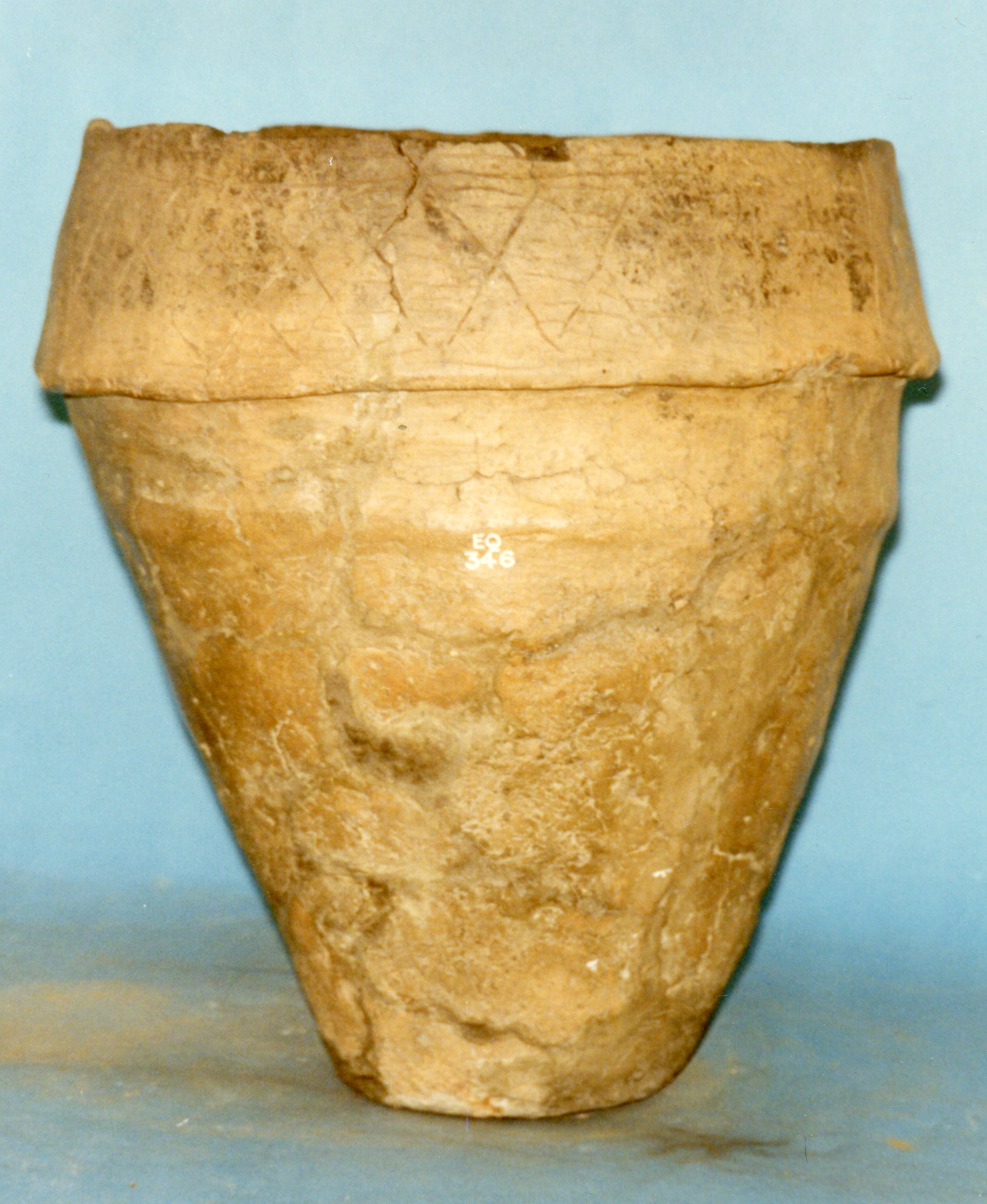 Image of Cinerary urn with overhanging rim, decorated with incised and impressed patterns, from Kettle Farm, Fife © National Museums Scotland