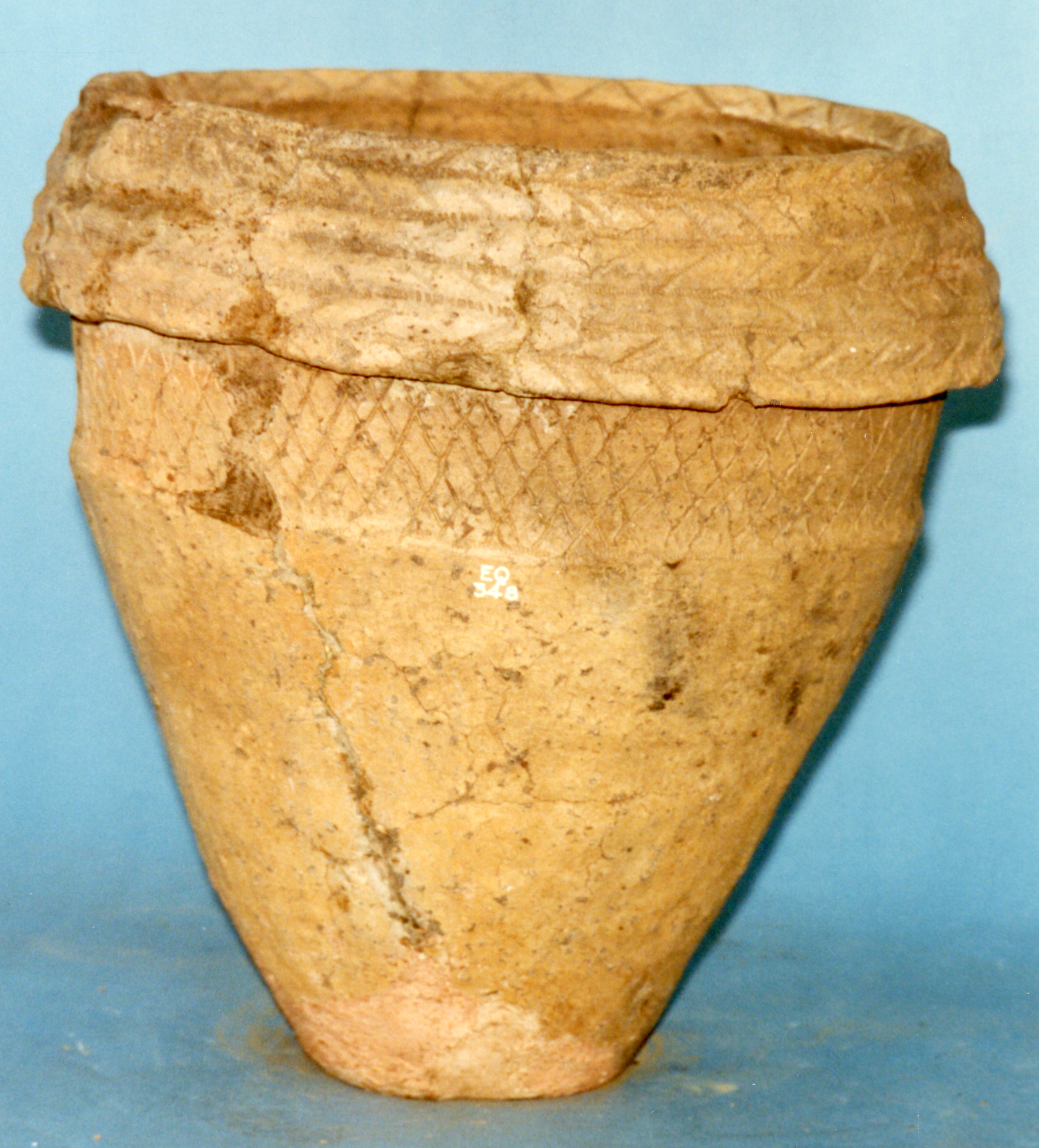 Image of Urn of dark ware with heavy overhanging rim, decorated with zigzag, lattice and other patterns, from Kettle Farm, Fife © National Museums Scotland