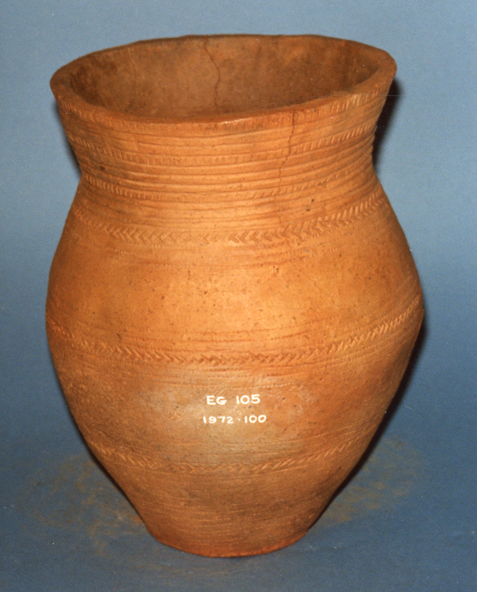 Image of Beaker of red buff ware with decoration in three zones and a hulled barley impression, from Skateraw, Chalcolithic or Early Bronze Age, 2300 - 2000 BC © National Museums Scotland