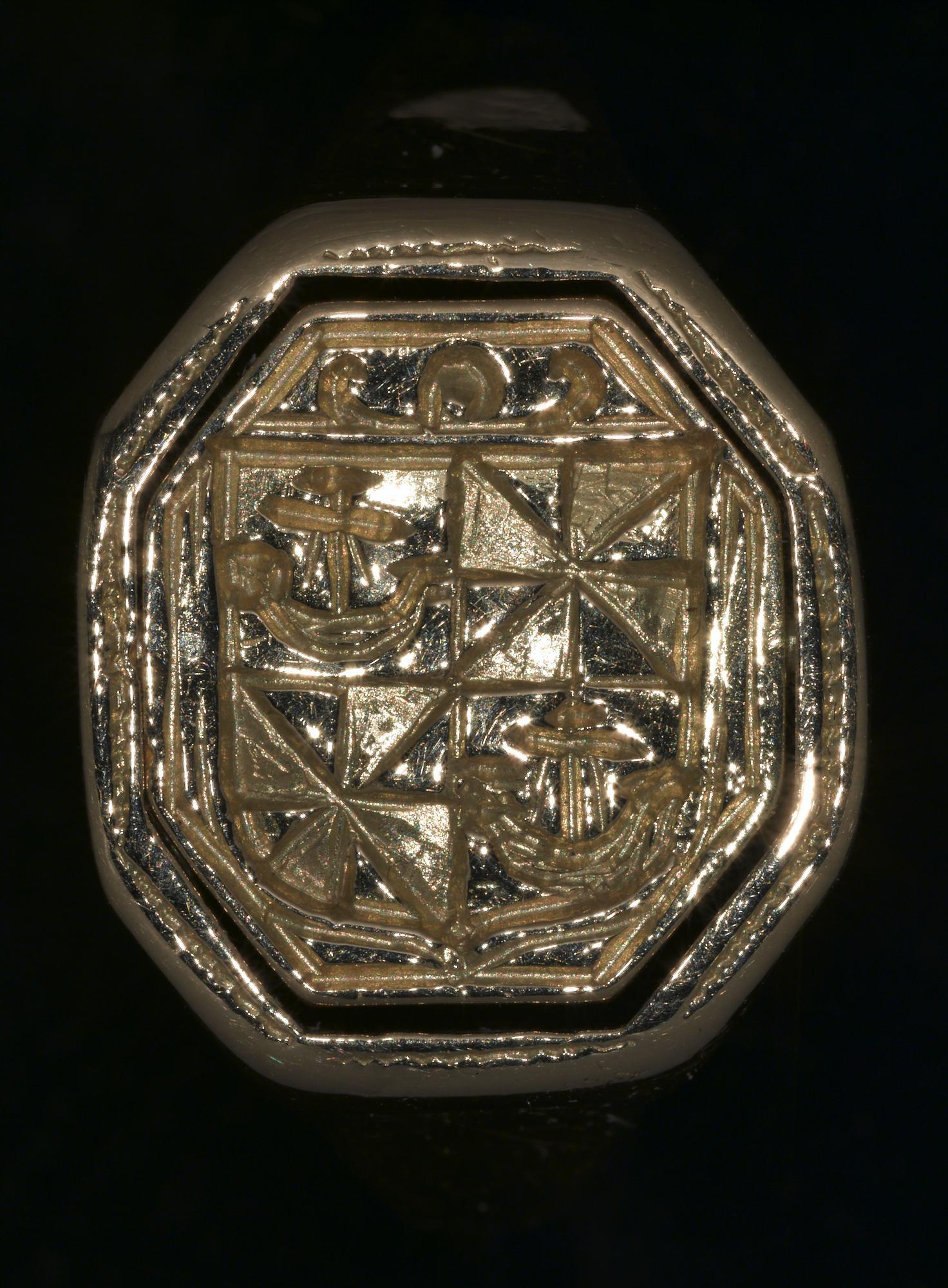 Image of Gold seal ring with a swivel, octagonal bezel, with a merchant
