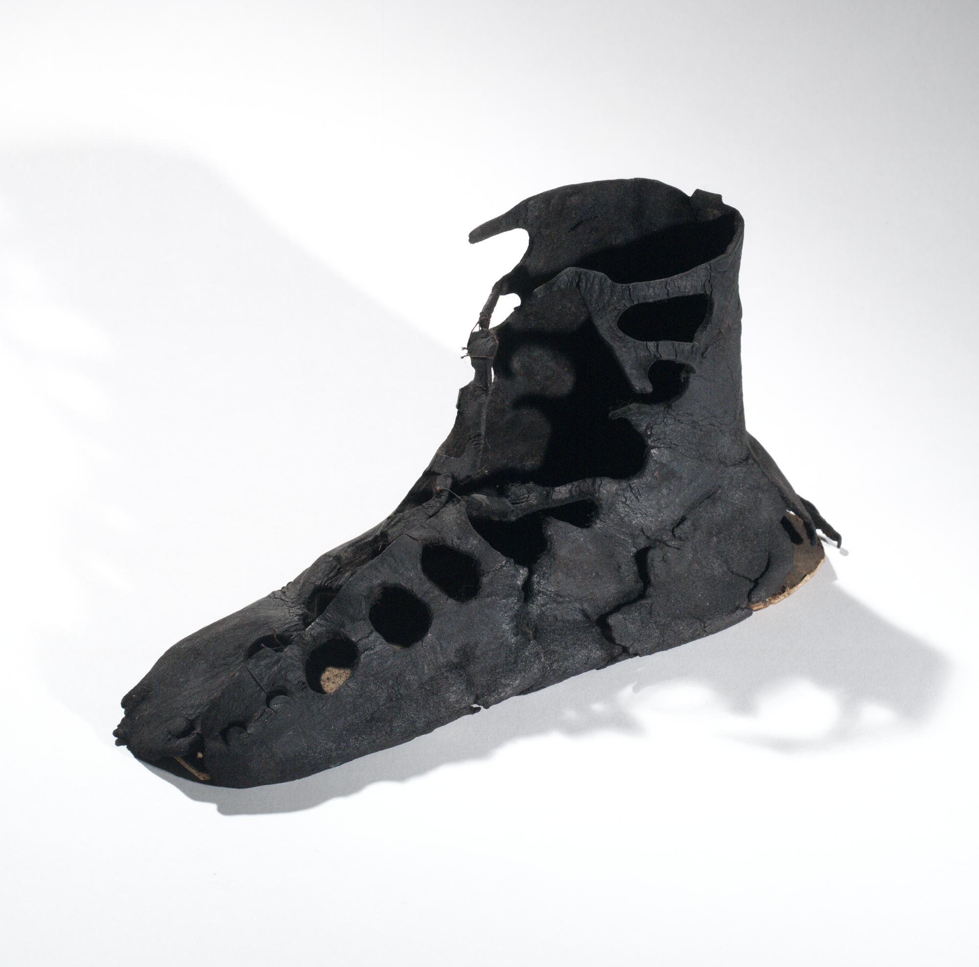 Image of Roman shoe or calceus of leather, with oval latchet holes, from the Roman site at Newstead, 90 - 110 AD © National Museums Scotland