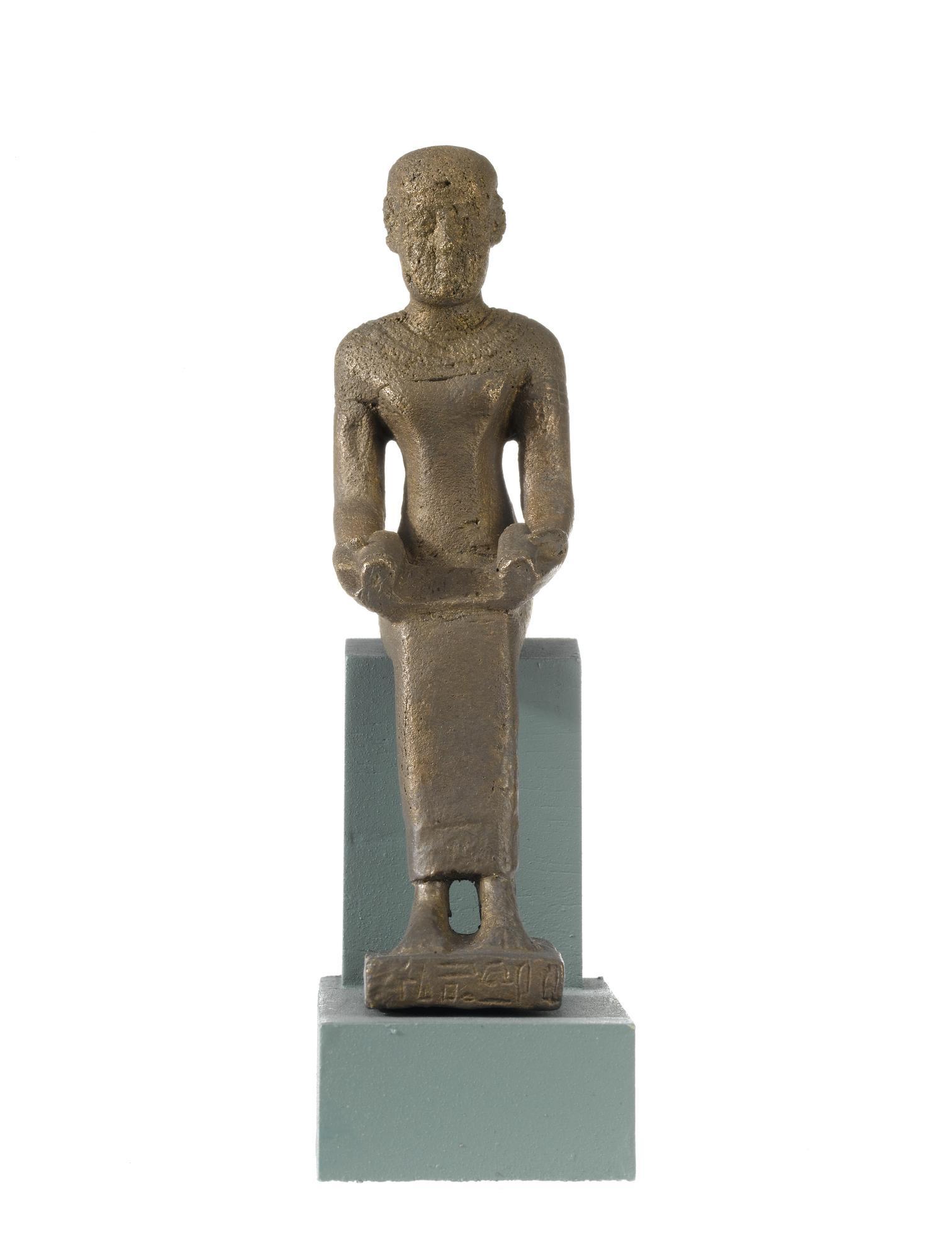 Votive statuette / god