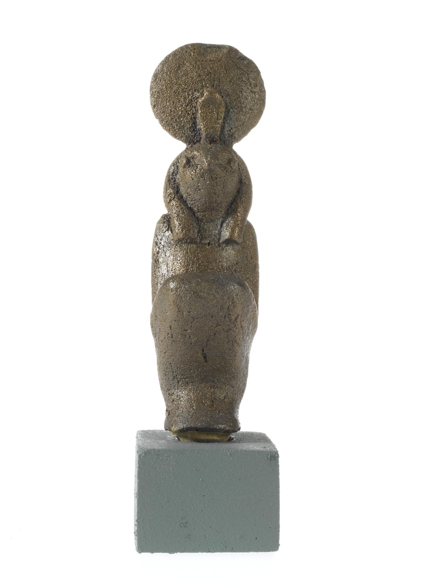 Votive statuette / god