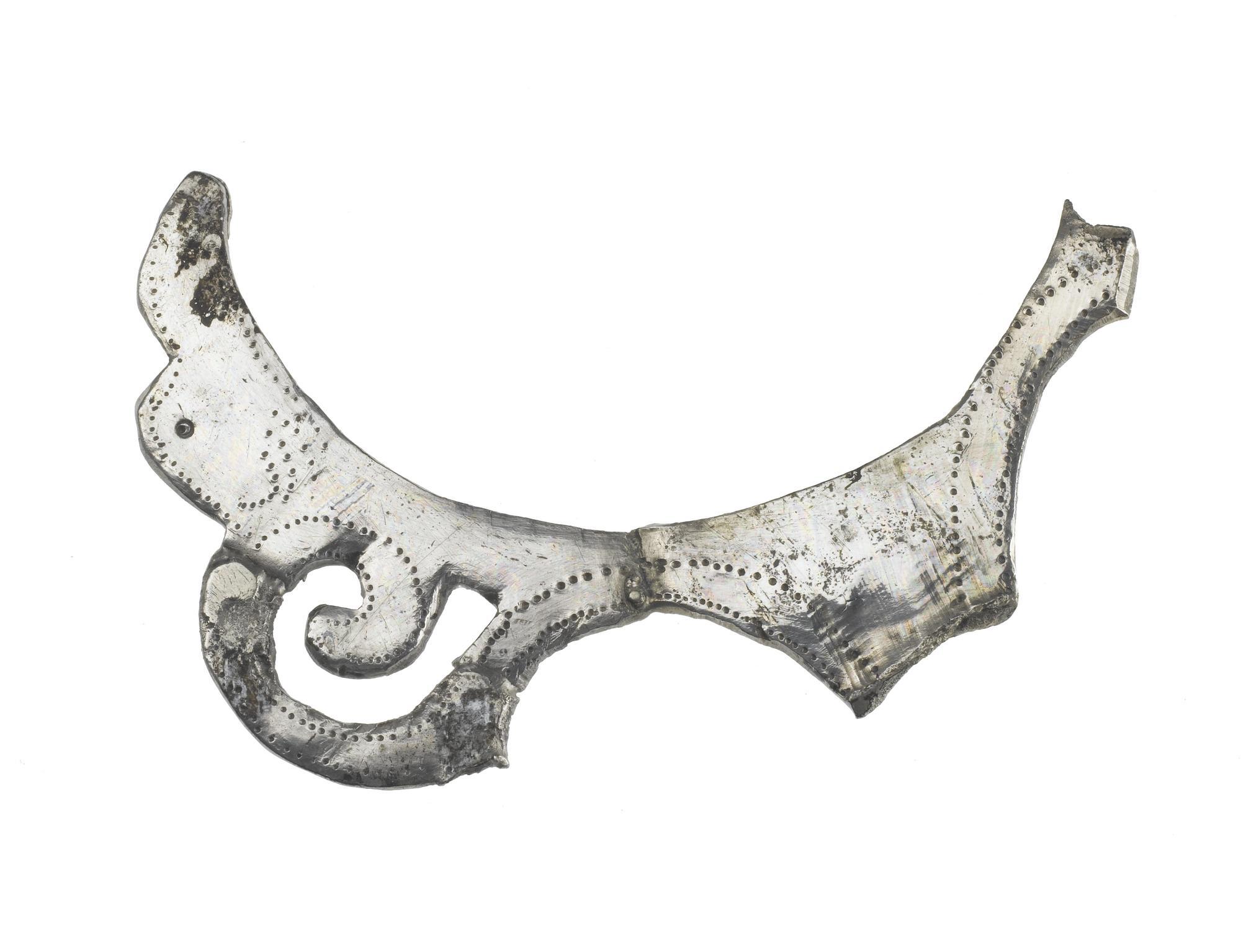 Image of Part of the pierced handle of a silver vessel, from Traprain Law © National Museums Scotland