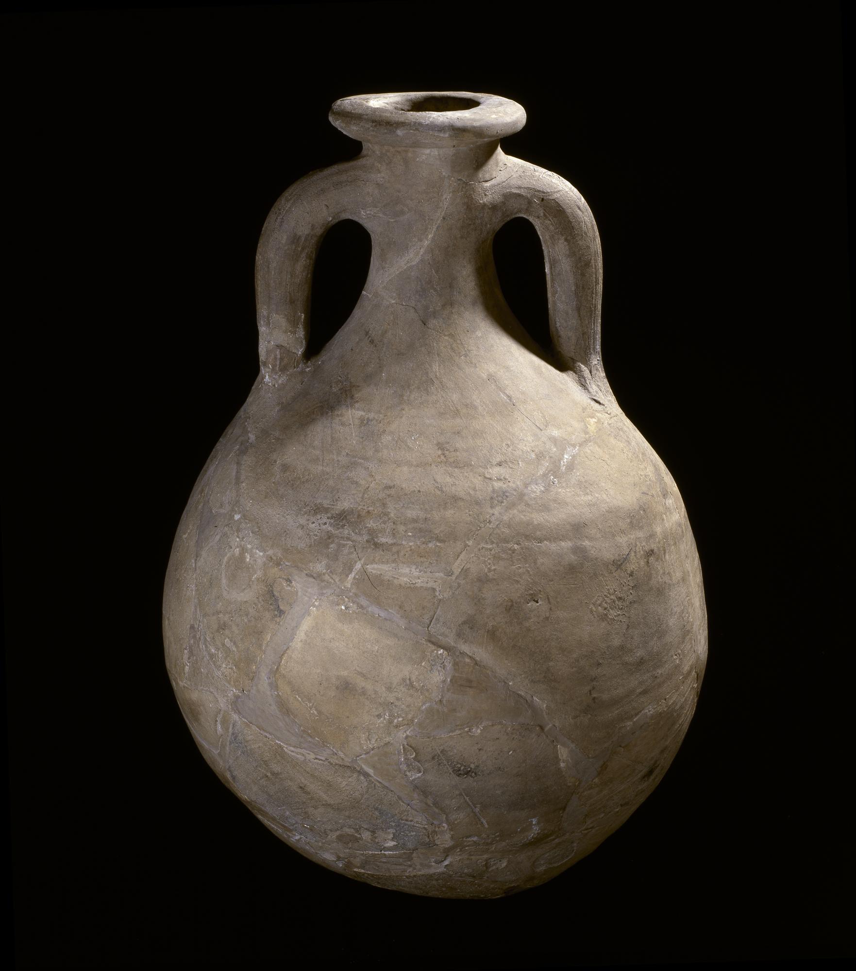 Image of Restored amphora with slightly elongated neck and rudimentary foot, from the Roman site at Newstead, 80 - 180 AD © National Museums Scotland