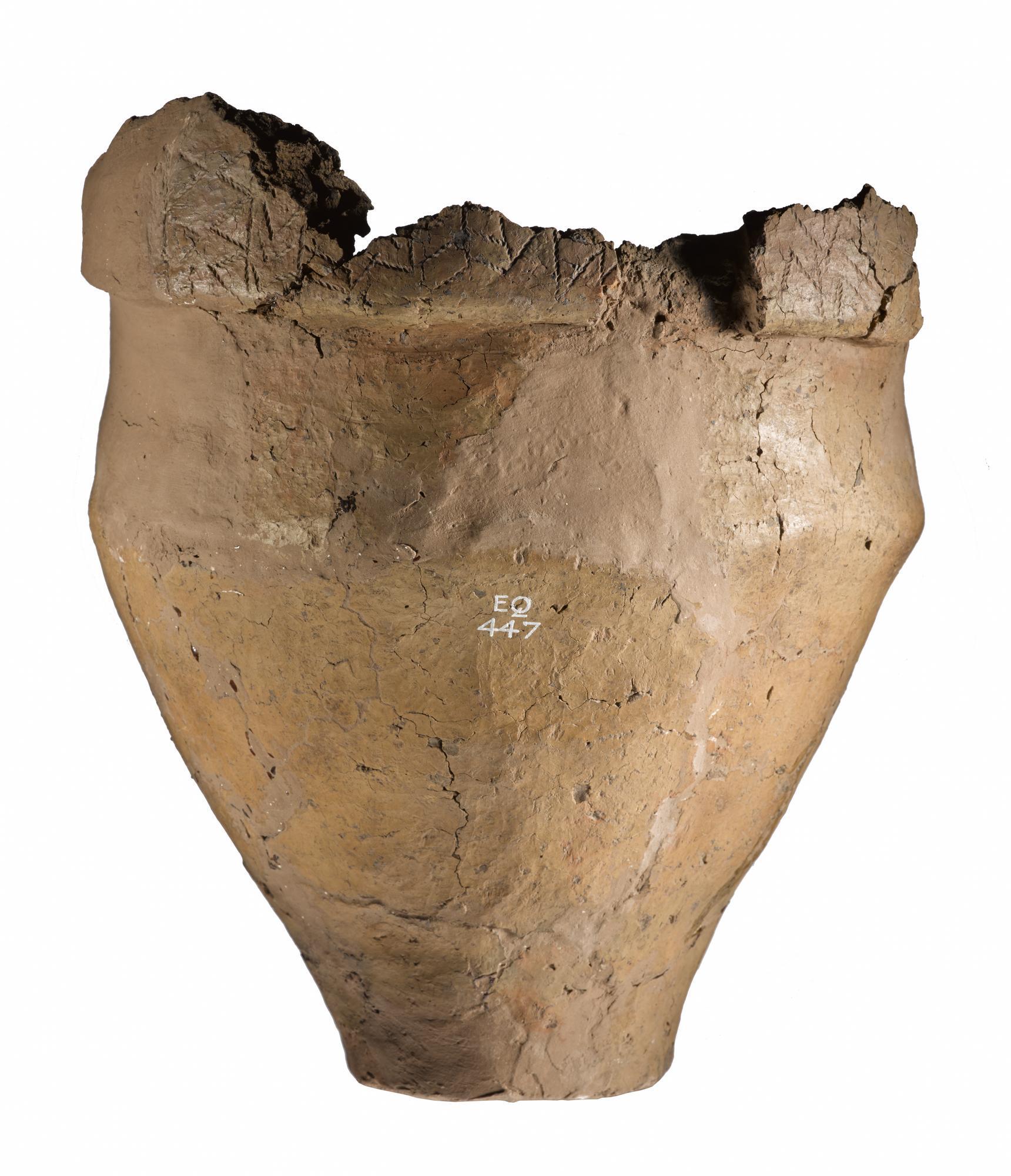 Image of Cinerary urn of brown clay, with overhanging rim, from sepulchral deposit at Outerston Hill, near Temple, Midlothian, Scotland © National Museums Scotland