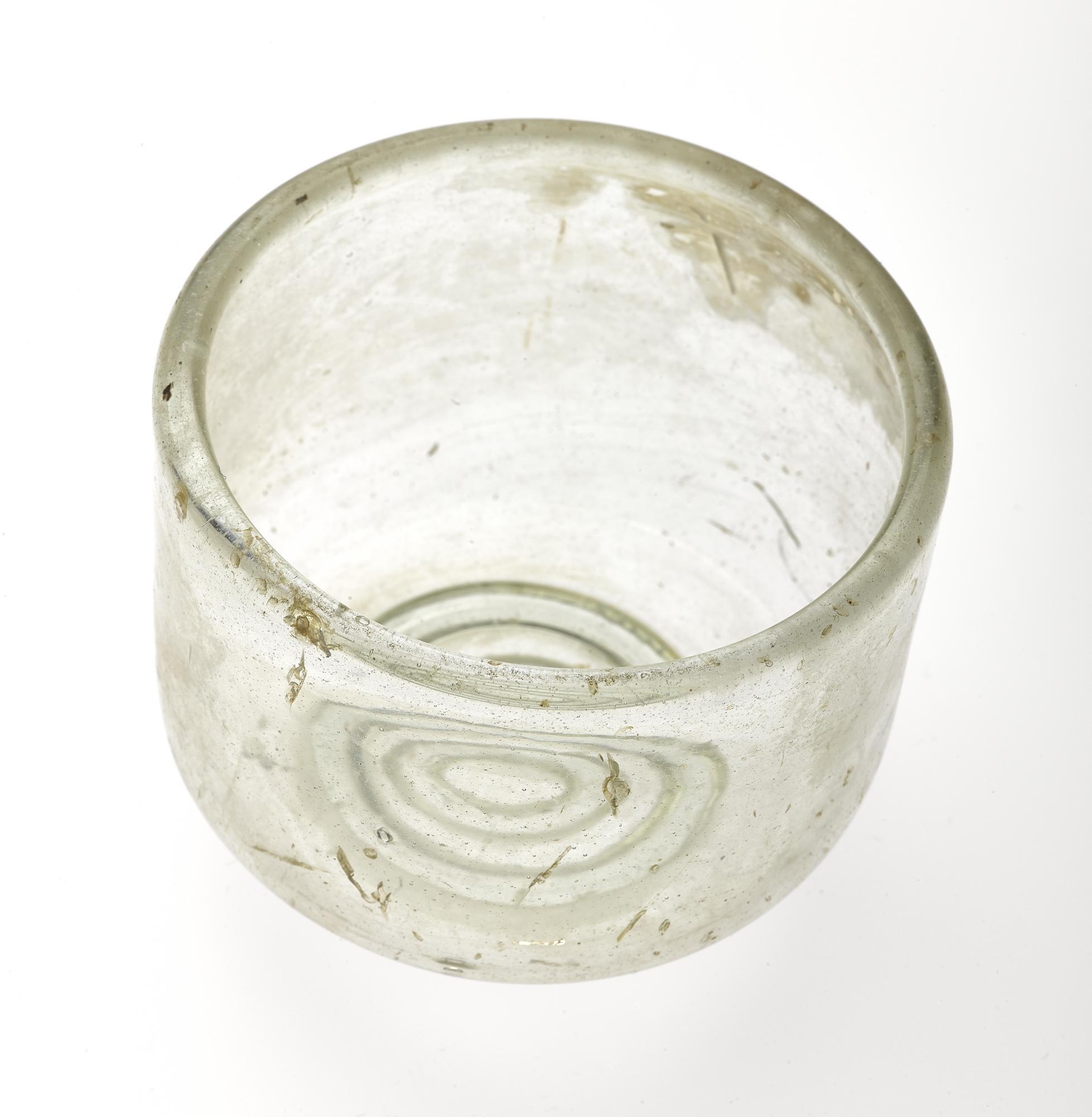 Image of Glass vessel, possibly a drinking bowl, from a burial at Airlie, Angus, 150 - 250 AD © National Museums Scotland