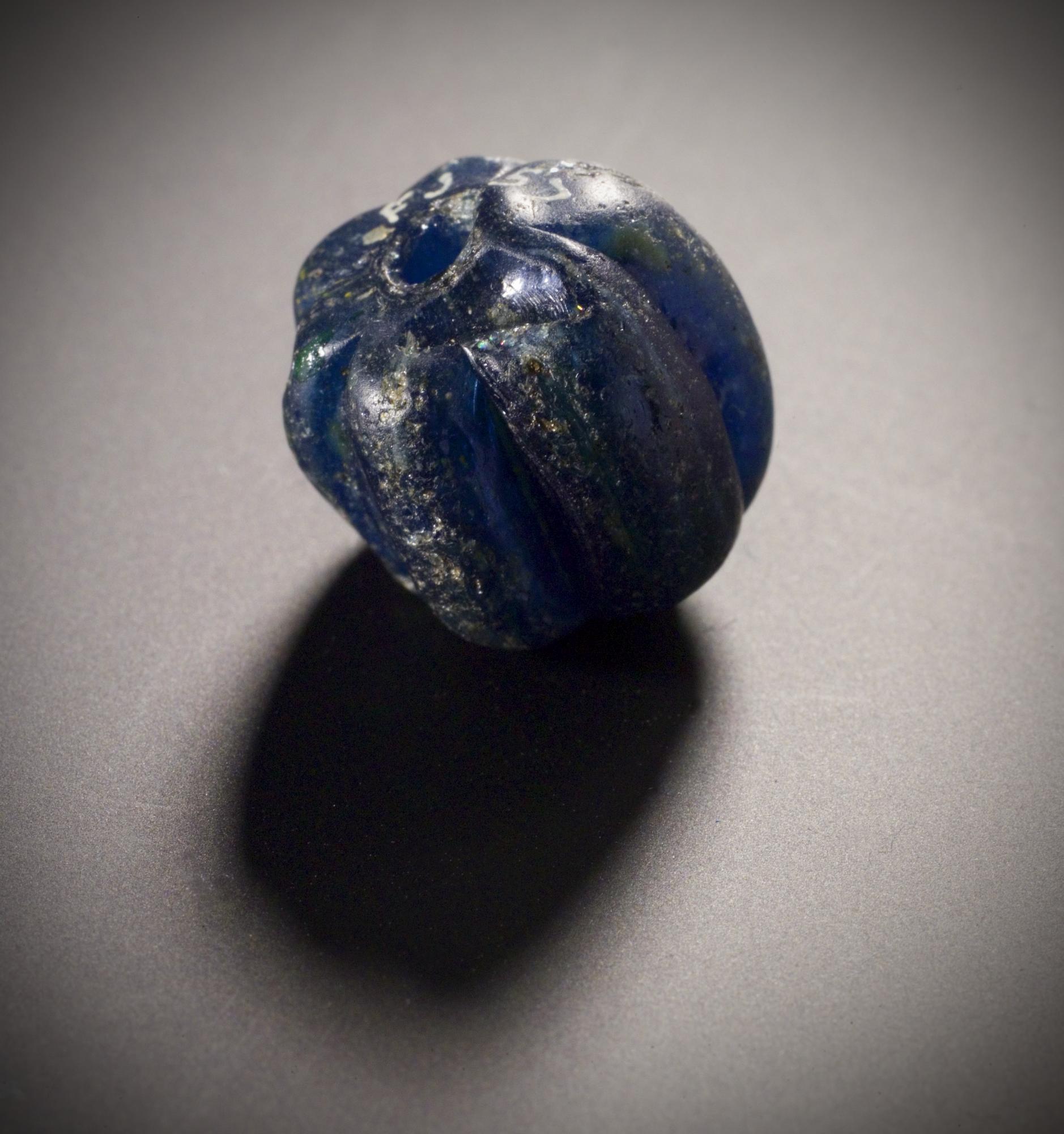 Image of Norse glass bead from Hillswick, Shetland © National Museums Scotland