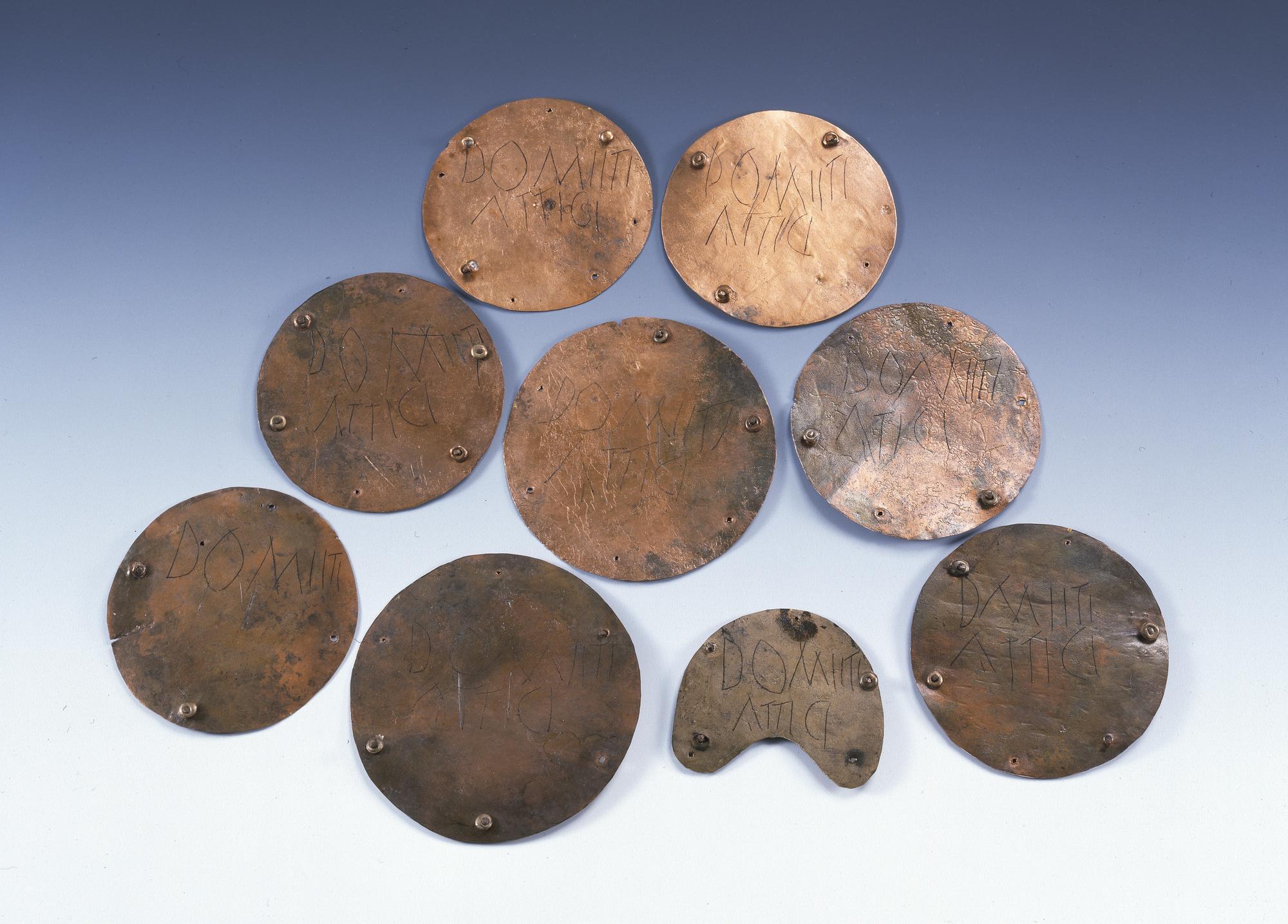 Image of Nine backing plates for phalerae of bronze, with owner
