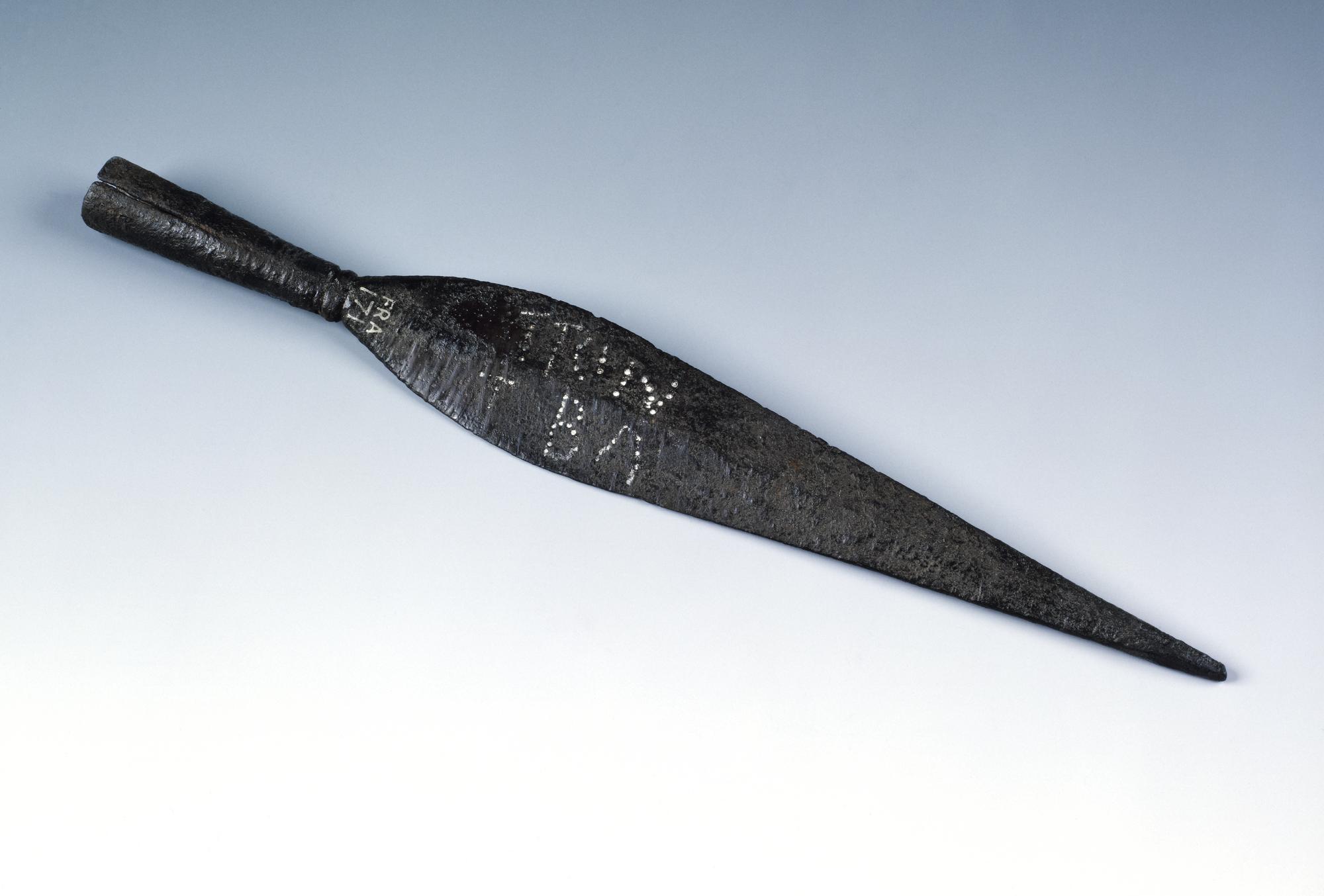 Image of Iron spearhead with punctured inscription indicating ownership, from the Roman site at Newstead, 80 - 100 AD © National Museums Scotland