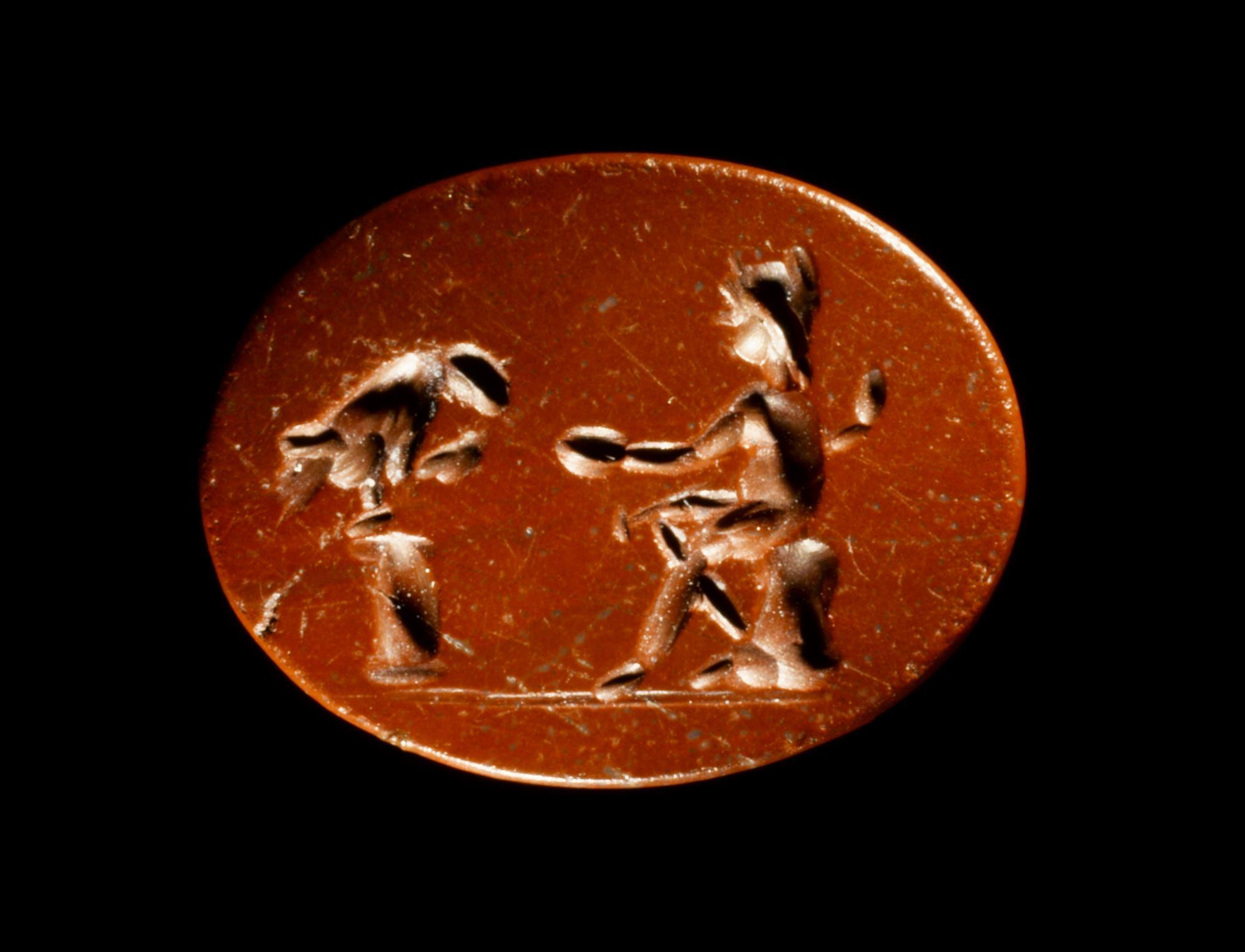 Image of Intaglio showing Ganymede feeding the Eagle, from the Roman site at Newstead © National Museums Scotland
